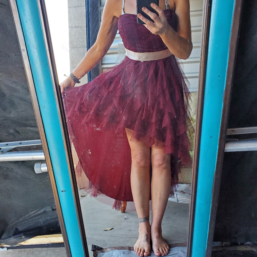 Wine colored strapless high low sparkly tulle and satin dress